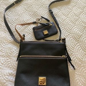 Used black Dooney and Bourke crossbody w/ wallet